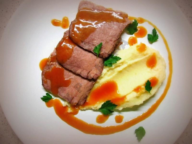 New Year's roast beef with meat sauce and celery root puree