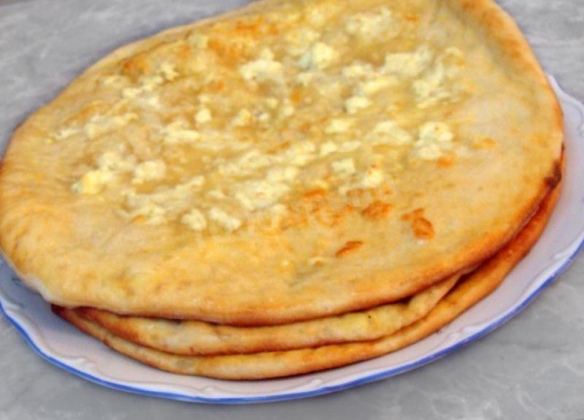 Mengrelian khachapuri with suluguni cheese