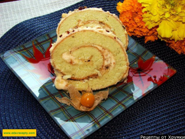 Sponge roll with cottage cheese filling and nuts