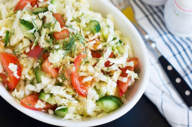 Salad of Peking cabbage cucumbers and tomatoes
