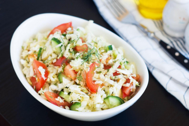 Salad of Peking cabbage cucumbers and tomatoes