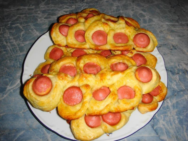 Sausage roll in yeast dough