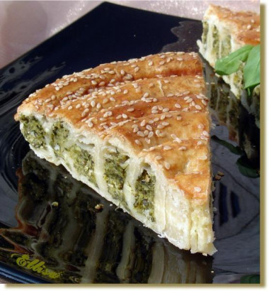 Layer cake with spinach, hard cheese and hercules