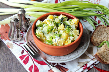 Salad with potatoes, egg and cucumber