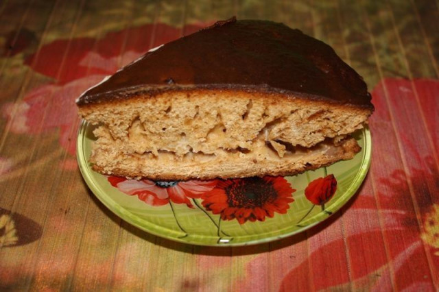 Honey cake with sour cream in chocolate glaze