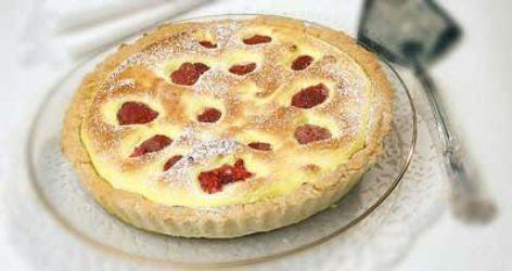 Sweet pies with strawberries, chocolate and nuts