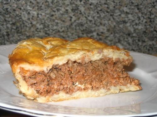 Yeast pie with minced meat and rice