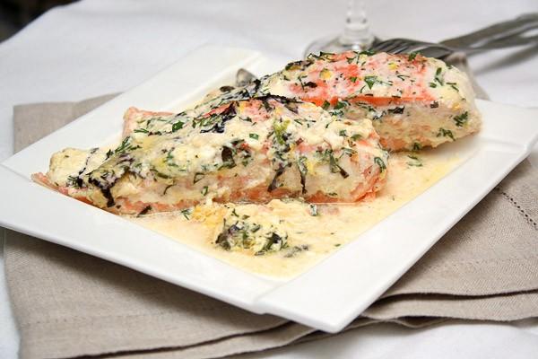 Baked salmon with herb sauce