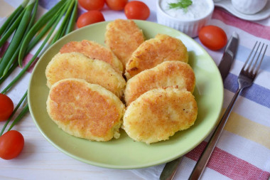 Classic potato patties in a frying pan