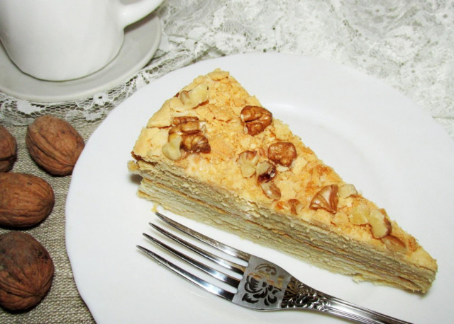Beer dough cake with condensed milk and walnuts filling