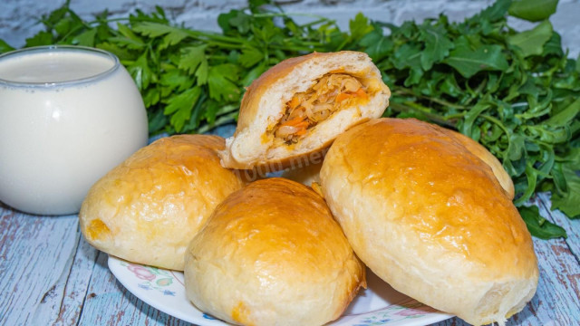 Pastry cabbage pies in the oven