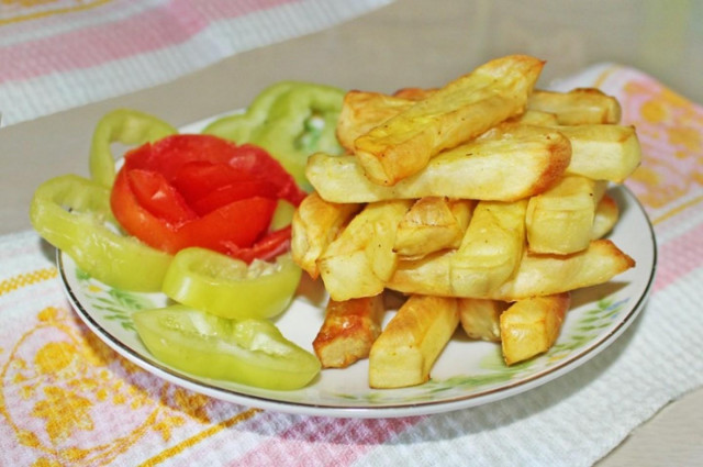 French fries in egg and paprika batter in the oven