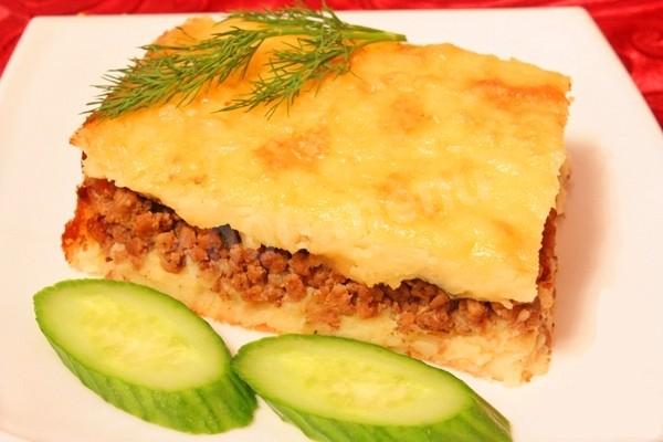 Casserole with potatoes and cheese meat in the oven