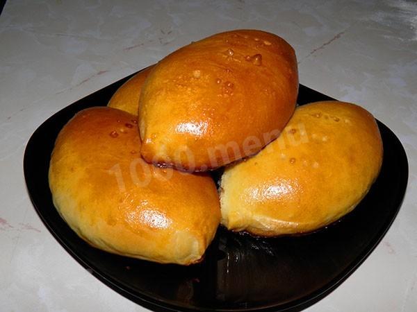 Unsweetened pastry pies, eggs and onions in the oven