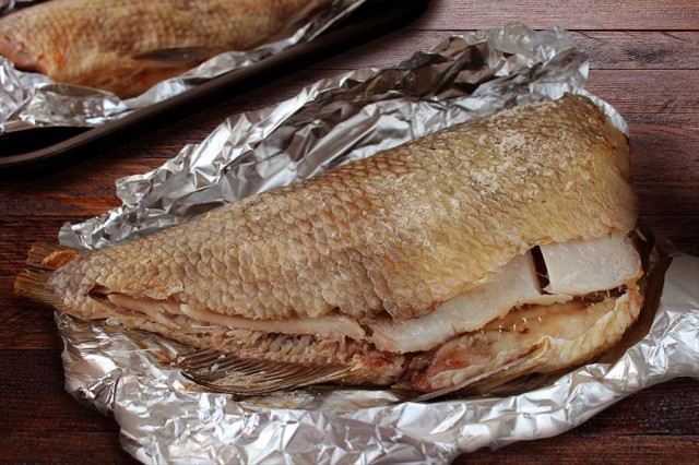 Bream baked in the oven in scales