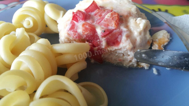 Chicken nests with cheese and tomatoes in the oven