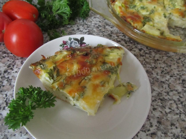 Zucchini casserole with cheese in the oven