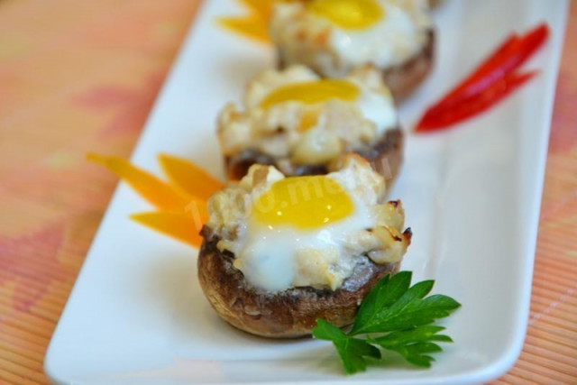 Mushrooms stuffed with chicken and quail eggs