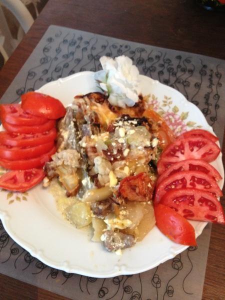 Meat in cauliflower with vegetables in the oven