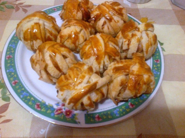 Baked strawberry pies in the oven with minced meat