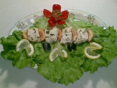 Pangasius fillet with apples and herbs in wine in the oven