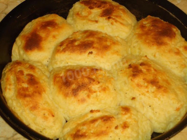 Potato patties with hard cheese in the oven