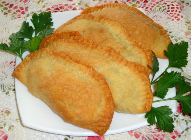 Chebureks with fried meat