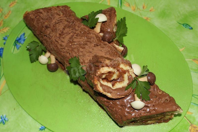 Log roll with buttercream and cocoa on Christmas