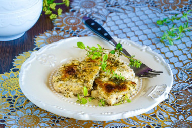 Casserole from fish fillet in cream with hard cheese