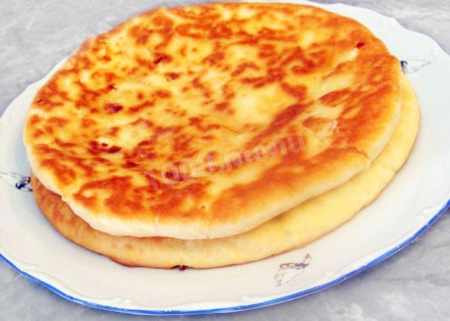 Khachapuri on sour cream without yeast with suluguni