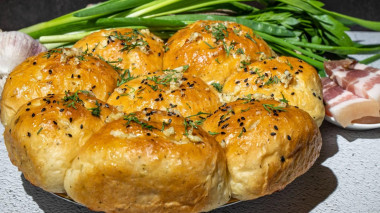 Butter dumplings with milk in garlic filling