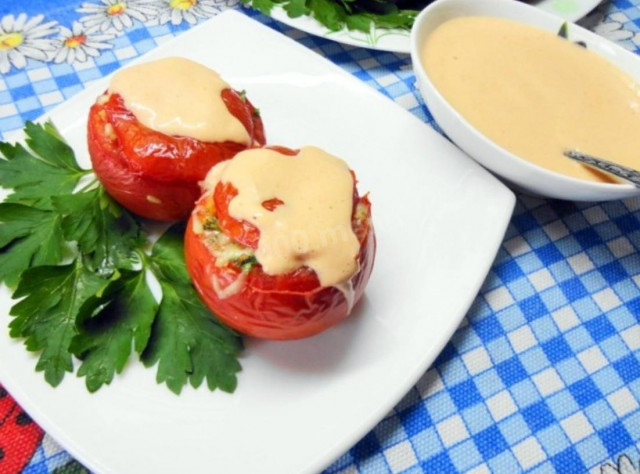 Stuffed tomatoes with cheese filling with onion parsley