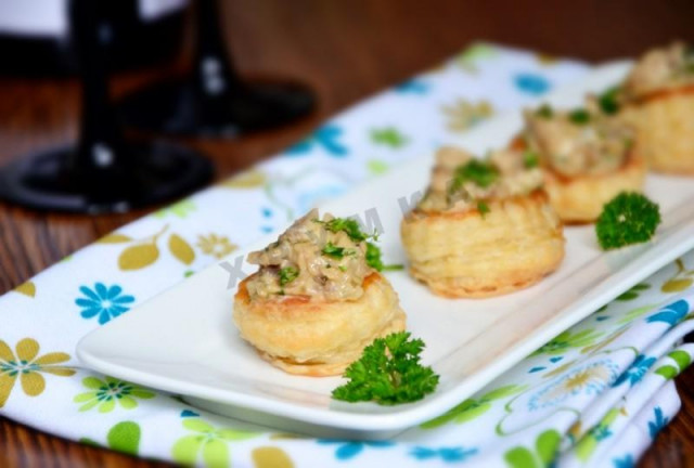 Puff pastry with cheese and mushrooms on a ready-made puff pastry