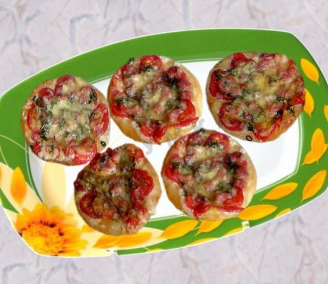 Mini pizza with salami and cherry puff pastry