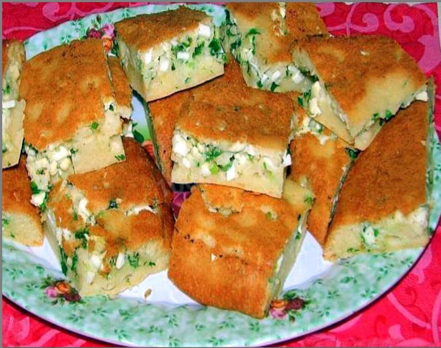 Aspic pie with green onion and egg on mayonnaise and sour cream