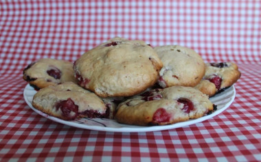 Homemade vanilla cookies on sour cream with cherries