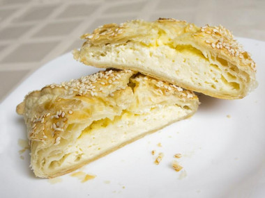 Khachapuri layered with cheese and cottage cheese