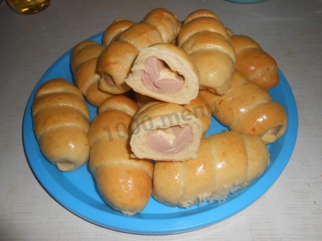 Sausages and cheese in dough