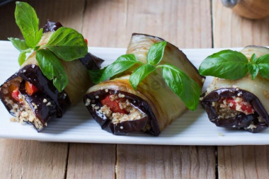 Eggplant rolls with tomatoes and walnuts