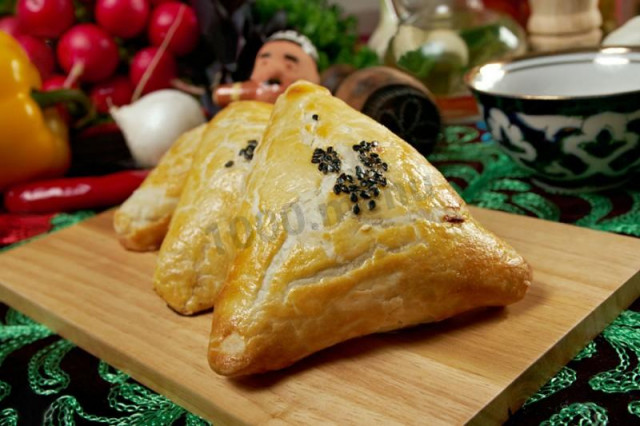 Samsa with cheese in water and butter