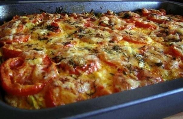 Zucchini with baked tomatoes, cheese and meat