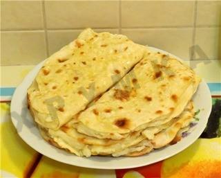 Tortillas without eggs in a frying pan lean Kystyby with potatoes