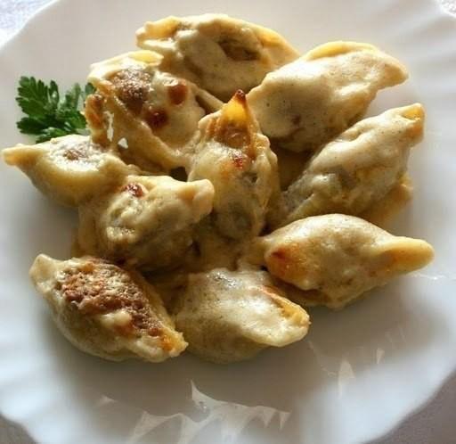 Shells stuffed with ricotta and hard cheese