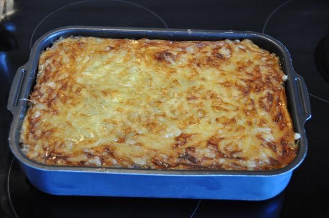 Buckwheat and chicken casserole with sour cream and cheese