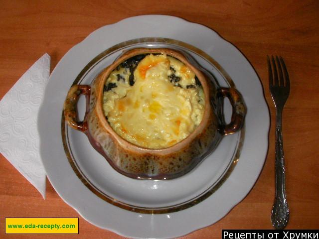 Potatoes with mushrooms and meat in a pot