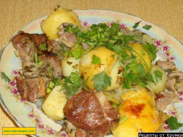 Baked meat in a sleeve with mayonnaise, potatoes and onions