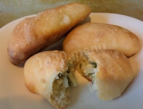 Yeast dough buns with egg and rice filling