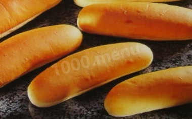 Yeast buns for hot dogs in butter