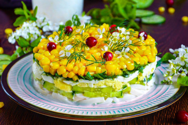 Squid salad with egg and cucumber with corn