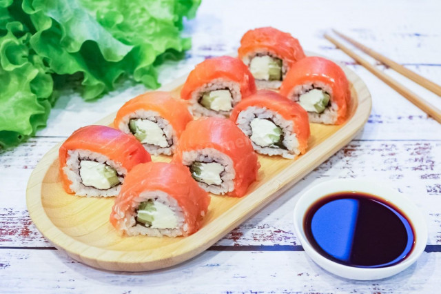 Rolls with red fish and cucumber at home